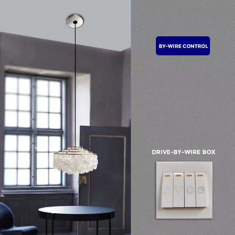 Modern dining room featuring a chandelier with drive-by-wire box controls on the wall.